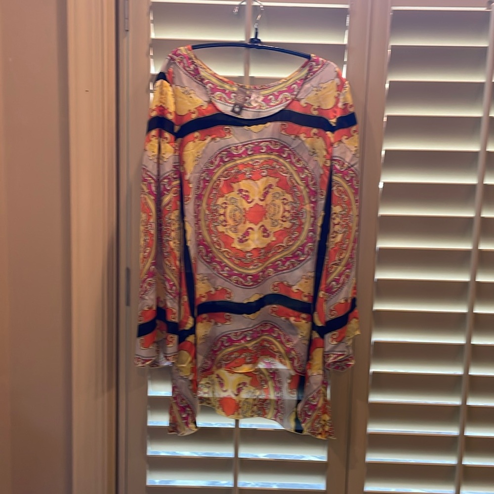 SOLO Moda long sleeve lightweight tunic with sleeve cutouts.